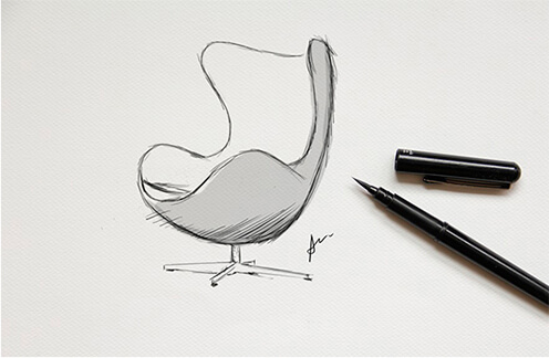 Black and white sketch of Egg Chair with black pen laying next to it